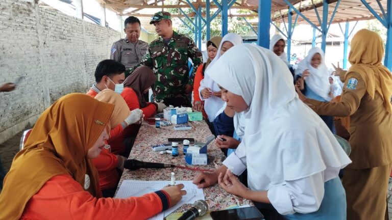 Sinergitas Polres Probolinggo Kota Bersama Kodim 0820 Salurkan Vitamin Tekan Stunting