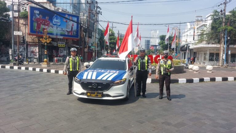 Momentum Proklamasi, Satlantas Malang Kota Gelar Aksi Nasionalisme di Jalan Raya