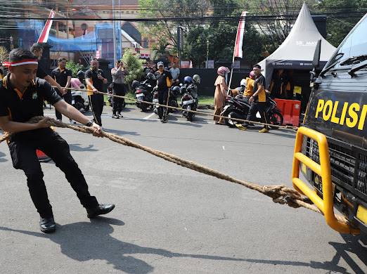 Seru! Tiga Pilar Makan Krupuk Hingga Lomba Tarik Truk Pasukan Polresta Malang Kota Sambut HUT ke-80 RI